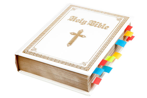 The holy bible on a white background with place-holder tabs. Clipping path included.