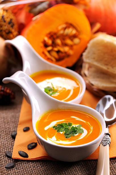 istock Pumpkin soup with creme fraiche 184638740