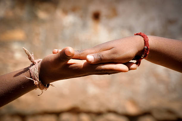 istock Two people holding hands that care for each other 184638776