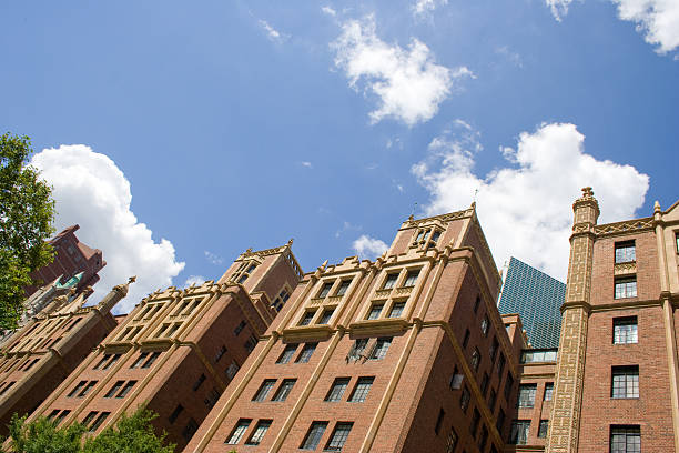 istock Row of brownstones against blue sky 184638799