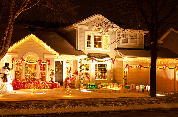 Christmas fairy tale house with warm glow windows at nighttime city street, symbolizes spirit of winter season emanating warmth and joy to all who pass by festive city street on New Year eve