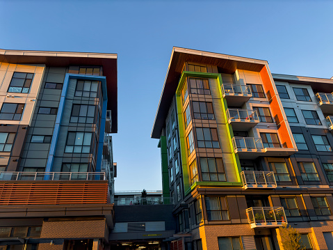 A new colorful apartment building in sunset light on a sunny afternoon, Vancouver, Canada