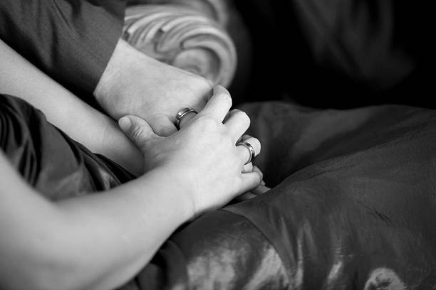 istock Bride and groom holding hands 184639324