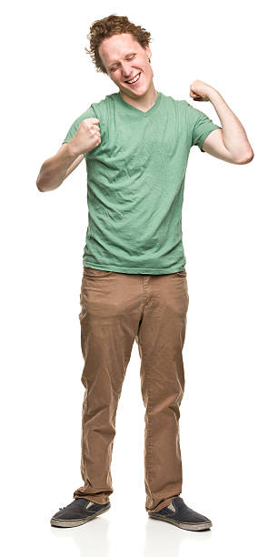 istock Excited Young Man Shakes Fists 184639833