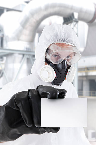 wissenschaftsberuf - radiation protection suit toxic waste protective suit cleaning stock-fotos und bilder