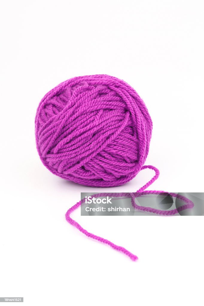 Ball of purple wool on a white background Wool Ball Of Wool Stock Photo