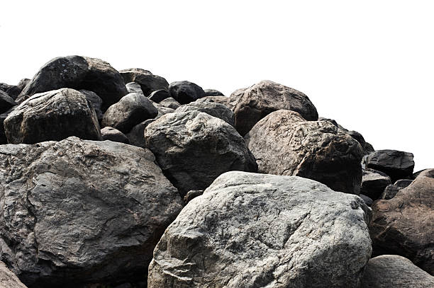 Heap of dark stones Heap of dark stones isolated on white background. boulder rock photos stock pictures, royalty-free photos & images