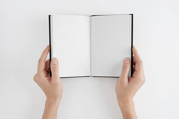 istock Woman Hands Holding Blank Book 184641746