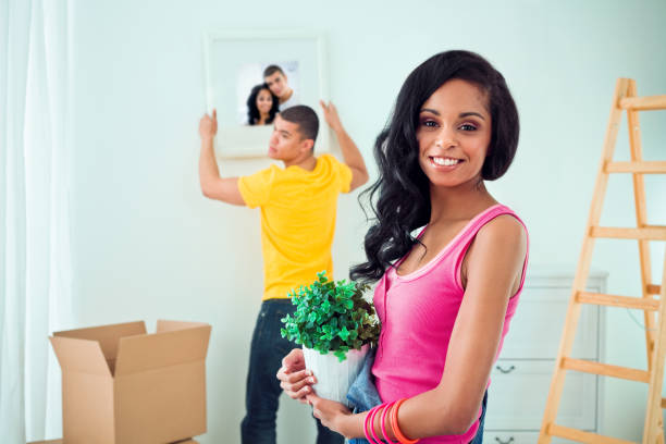 istock Couple arranging their apartment 184641846
