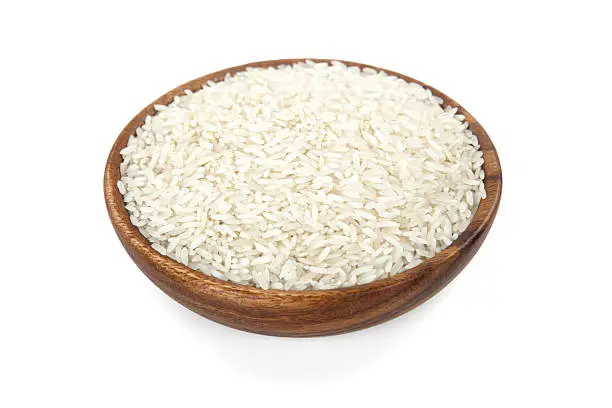Photo of Rice in a wooden bowl