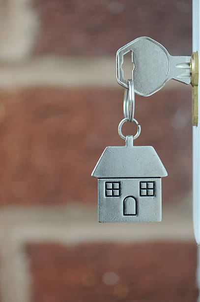 istock Key in the Door with copyspace 184642331