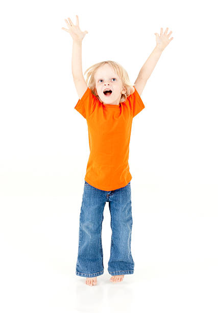 istock Little Boy Jumping on White Background 184642572
