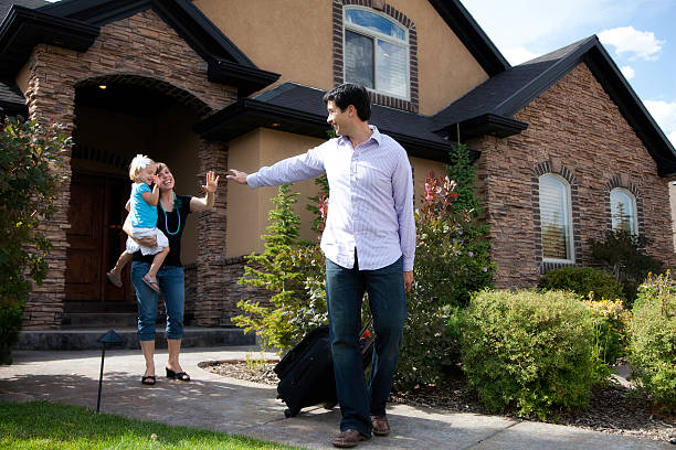 istock Going on a Business Trip- Dad Waves to Family 184643035