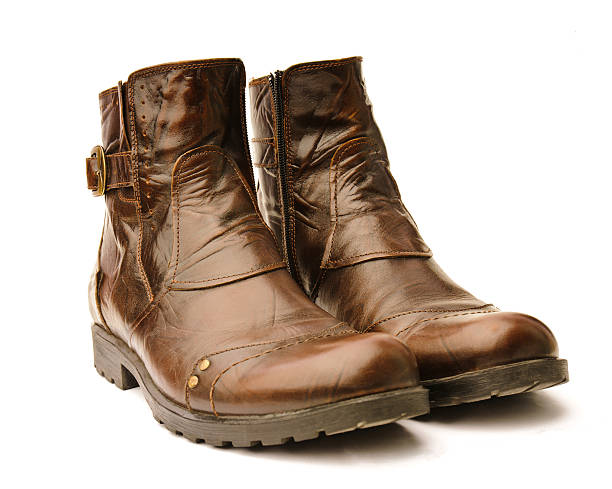 handmade leather hiking boots isolated on white background.