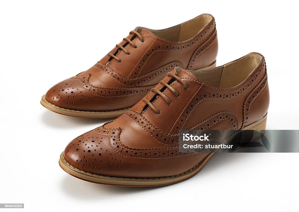 Tan Brogues pair of brown brogues isolated on white Brogue Stock Photo