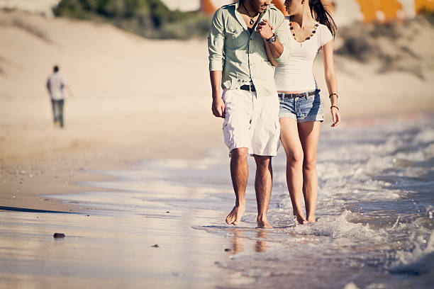 istock Young Couple on the Beach 184643708