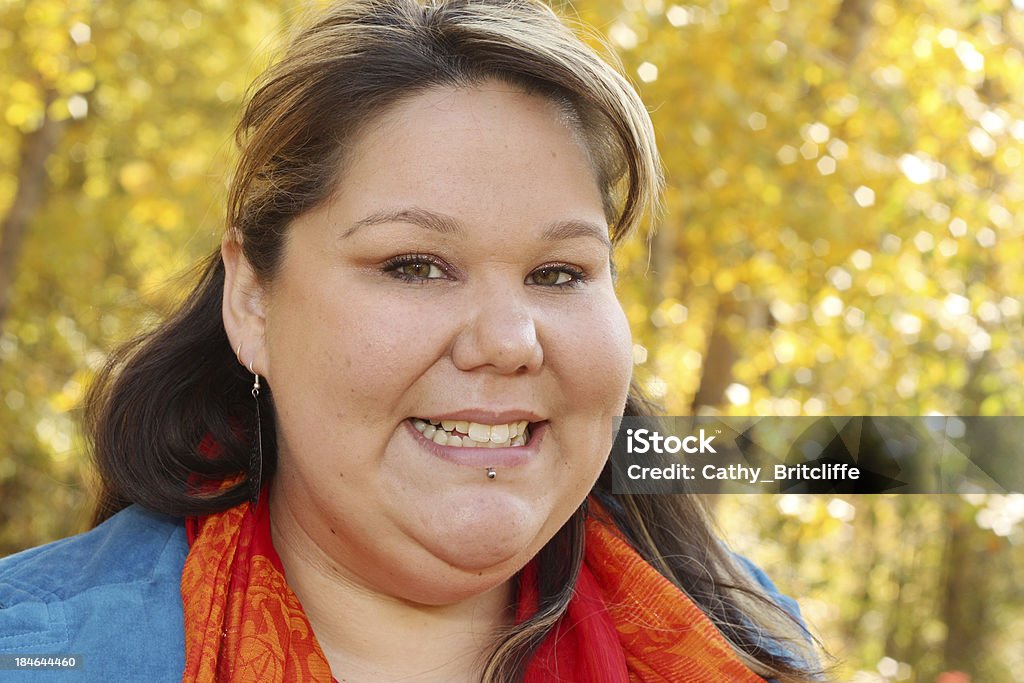Woman In Autumn A photograph of a woman in an autumn setting. Indigenous Peoples of the Americas Stock Photo