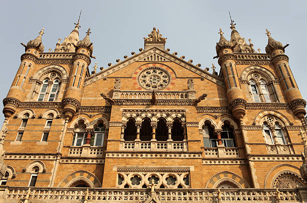 This image showcases the Afghan Church, also known as the Church of St. John the Evangelist, located in the Colaba area of Mumbai. Renowned for its Gothic Revival architecture, the church stands as a tribute to the soldiers of the First Afghan War of 1838. What stands out in the photograph are the church's impressive features, notably its towering spire and the exquisite stained glass windows that adorn the building. These windows, rich in colour and detail, cast a kaleidoscope of light within the church, adding to its solemn and reflective atmosphere. The image aims to capture both the architectural magnificence and the historical resonance of the Afghan Church, highlighting its role as a significant landmark in Mumbai's rich tapestry of history and culture.