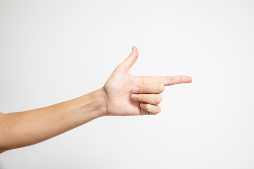 A finger pointing to the right against a white background signifies a clear and straightforward direction.