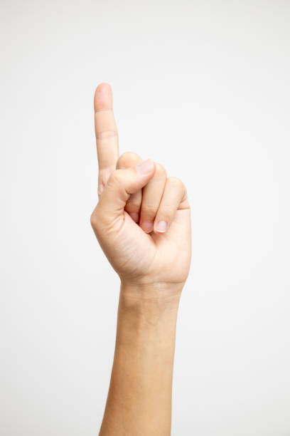 A single finger raised in a gesture against a white background.