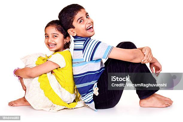 Foto de Retrato De Alegre Indian Irmão E Irmã Isolada No Branco e mais fotos de stock de Criança