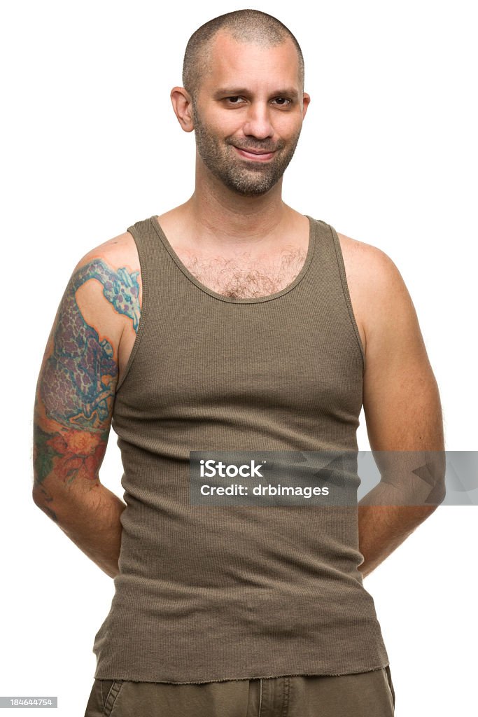 Smiling Tattooed Man Portrait of a man on a white background. http://s3.amazonaws.com/drbimages/m/mr.jpg Green Color Stock Photo