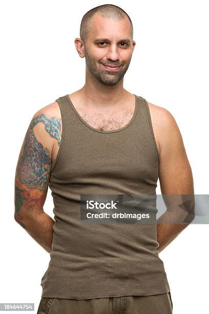 Smiling Tattooed Man Stock Photo - Download Image Now - Green Color, Shirt, Short Hair