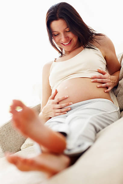 istock Pregnant woman at home 184644872