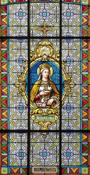 Photo of stained glass window on a religious theme