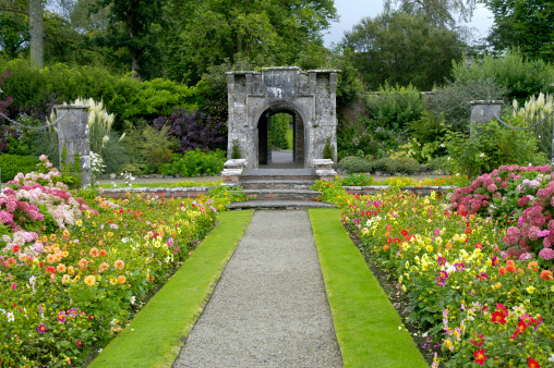 Stone arch gate to the walled gardens at Dromoland Castle in Ireland.