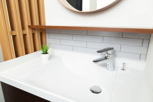 istock A washbasin in a newly built house. 1846451784