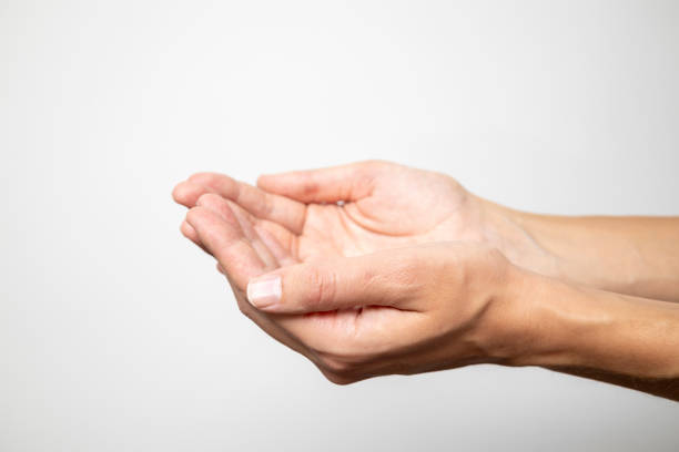 Cropped Hand Gesturing Against White Background