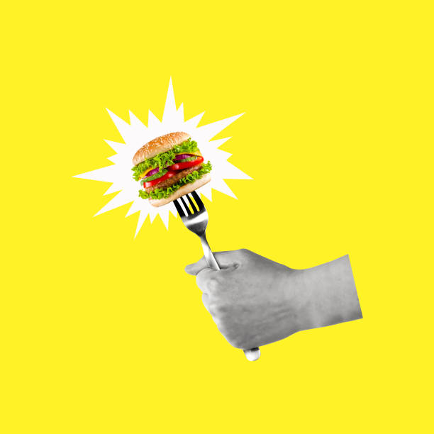 istock Contemporary art collage of hand holding a fork with burger. 1846463497