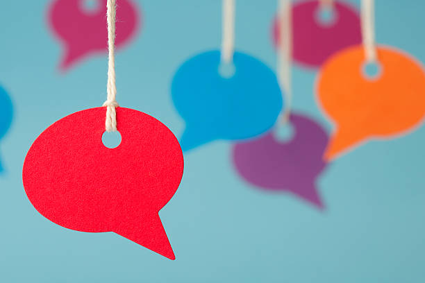 Blank speech bubble price labels Blank speech bubble price labels. Shallow depth of field focus on the red speech bubble in the foreground. gossip photos stock pictures, royalty-free photos & images
