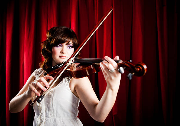 istock Young and Beautiful Violinist 184646409