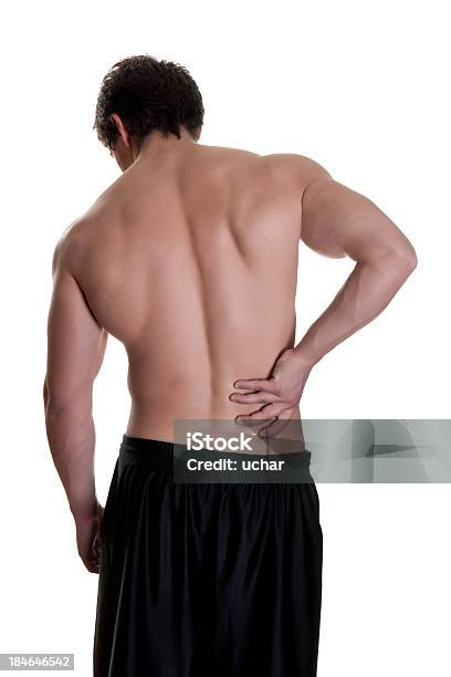 Dolor En La Parte Inferior De La Espalda Foto de stock y más banco de imágenes de Hombres - Hombres, Dolor de espalda, Desnudo