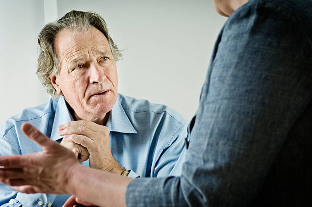 istock Mature Male talking To a Counsellor 184646588