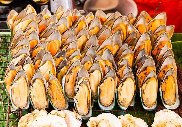 istock Grilled mussels on the grate 184646608