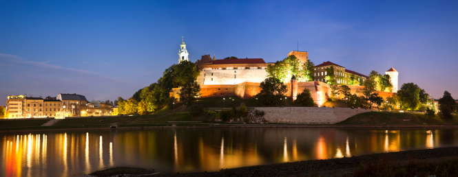 twilight panorama view of Wawel Royal Castle and Cathedral in Cracow (Krakow), Poland, Europe