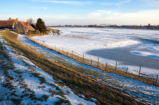 istock House on dutch dyke in winter landscape 184647135