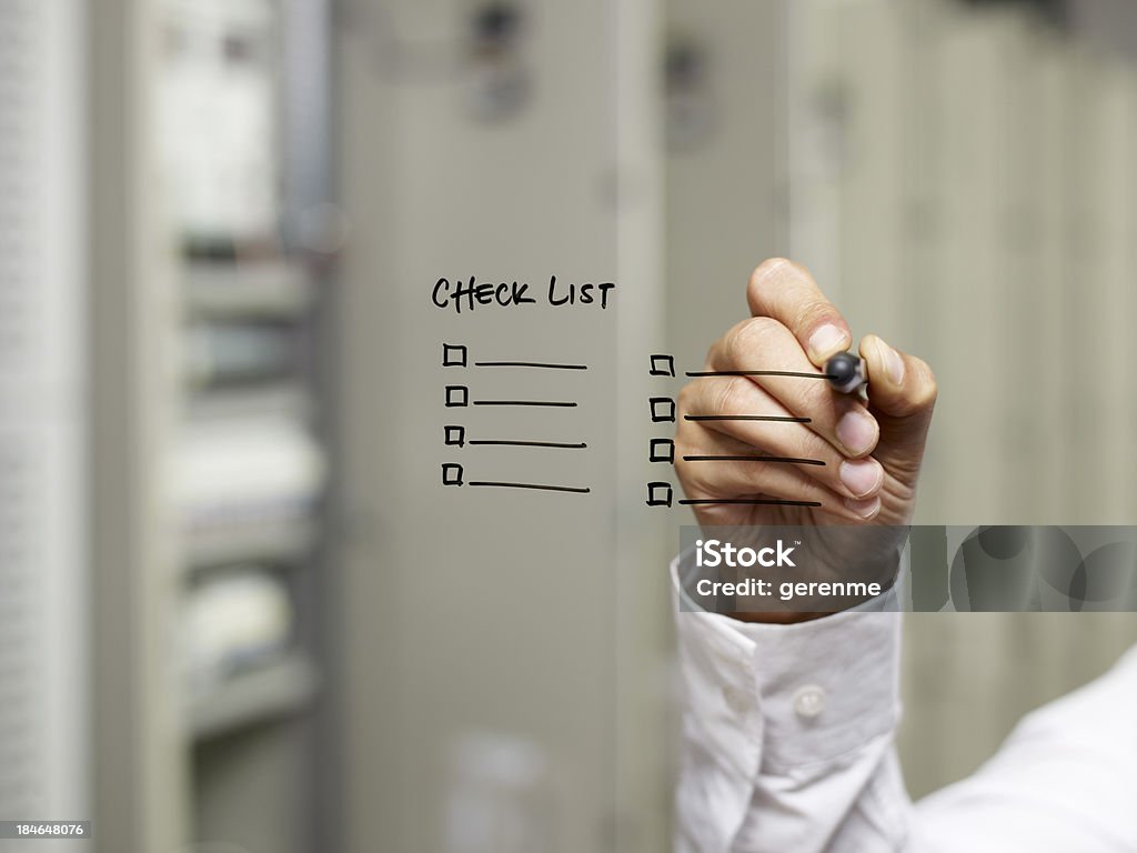 Empresario escribir lista de verificación - Foto de stock de Lista de chequeo libre de derechos