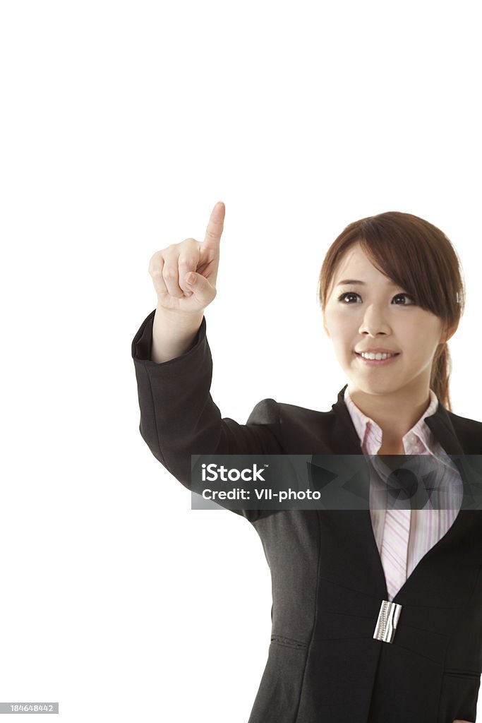 business woman pointing "Asian business woman raised hand and pointing by finger on white background, closeup portrait focus on hand ." Accessibility Stock Photo