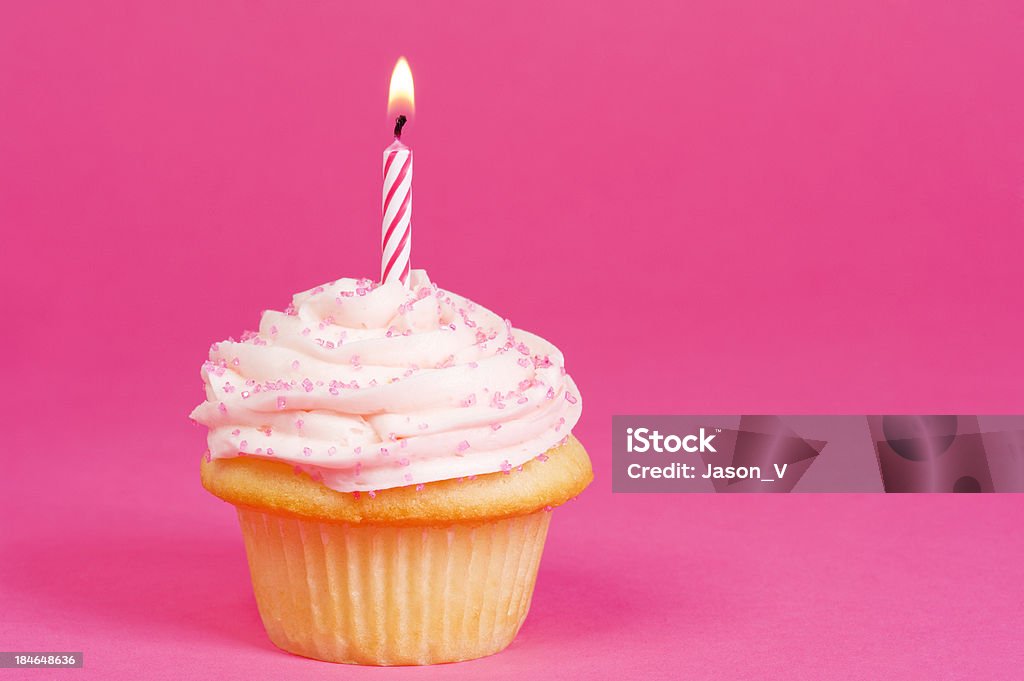 Cupcake sur fond rose - Photo de Bougie libre de droits