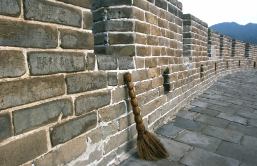 A lone cleaning broom waiting on the Great Wall of China