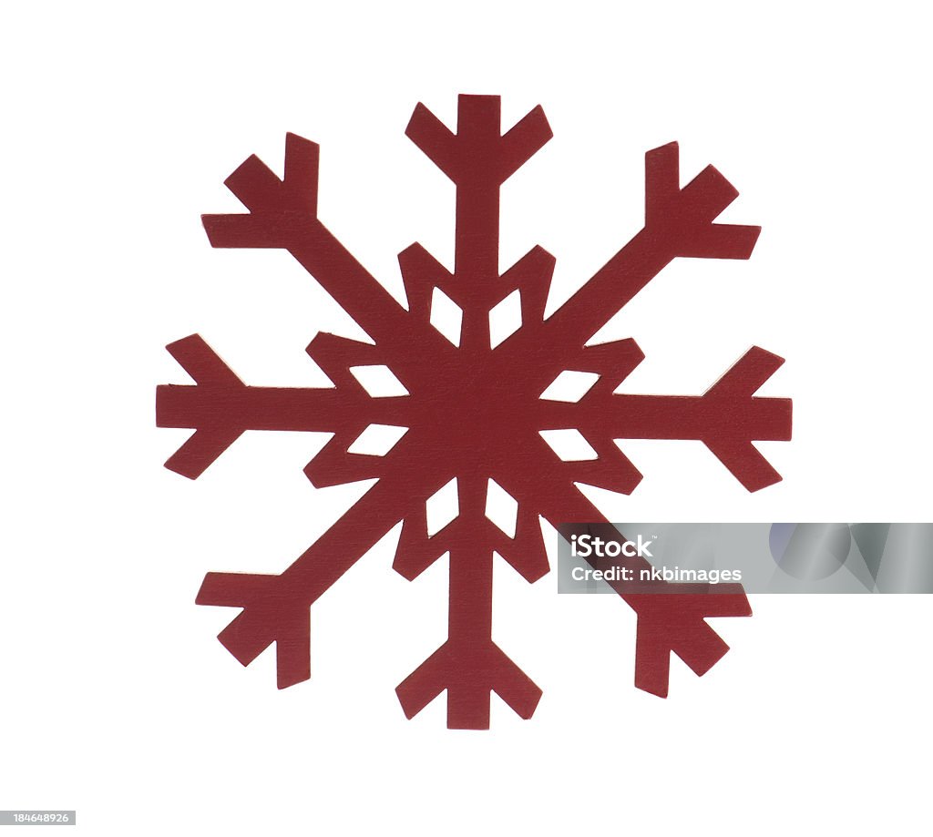 Rosso in legno dipinto di fiocchi di neve su sfondo bianco - Foto stock royalty-free di Legno