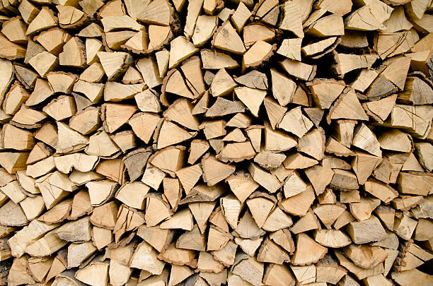 Stacked Logs Stacked Logs firewood photos stock pictures, royalty-free photos & images
