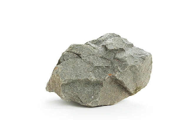 Detail photograph of a basalt rock on a white background http://www2.istockphoto.com/file_thumbview_approve/18042003/1/istockphoto_18042003.jpg boulder rock photos stock pictures, royalty-free photos & images