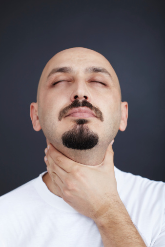 Man with sore throat