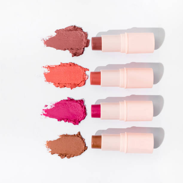 Collection of smudged lipsticks isolated on white