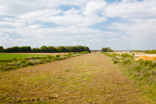 The green track of a former highway which had to be removed for a closer coming brown coal pit mine.